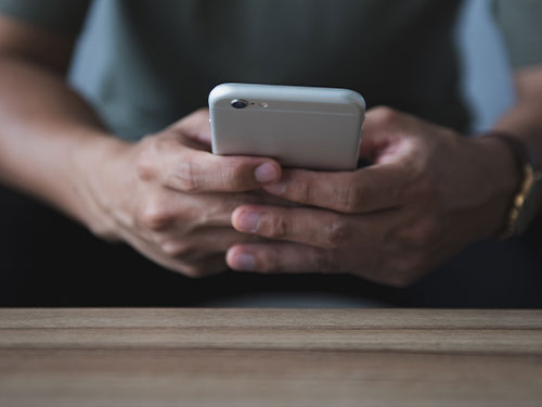 Smartphone in Hand: The Pros and Cons of Mobile Devices for Businesses